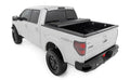 Hard Tri-Fold Flip Up Bed Cover | 5'7" Bed | Ford F-150 2WD/4WD (2004-2014) - The Suspension Specialists