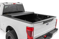 Hard Tri-Fold Flip Up Bed Cover | 6'10" Bed | Ford F-250/F-350 Super Duty (17-26) - The Suspension Specialists
