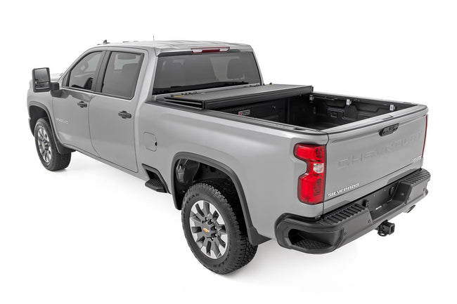 Hard Tri-Fold Flip Up Bed Cover | 6'9" Bed | Chevy/GMC  Silverado/Sierra 2500HD/3500HD (20-25)