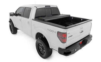 Hard Tri-Fold Flip Up Bed Cover | 6'7" Bed | Ford F-150 2WD/4WD (2004-2014) - The Suspension Specialists