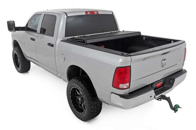 Hard Tri-Fold Flip Up Bed Cover | 6'4" Bed | Ram 1500/2500/3500 (10-25 & Classic) - The Suspension Specialists
