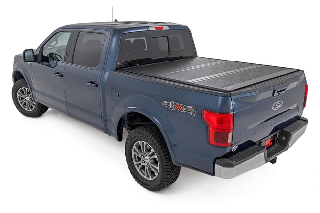 Hard Low Profile Bed Cover | 5'7" Bed | Ford F-150 (15-20)/Raptor (17-20) - The Suspension Specialists