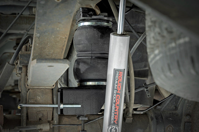 Air Spring Kit w/compressor | Ford F-250/F-350 Super Duty 4WD (2005-2016) - The Suspension Specialists