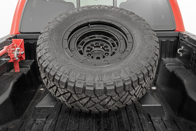 Bed Mount Spare Tire Carrier | Universal (5x5.5 6x5.5 6x135 & 5x5.0 Bolt Patterns) - The Suspension Specialists