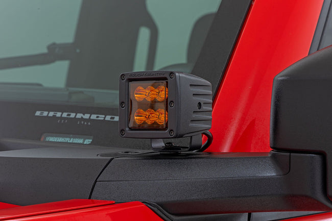 Rough Country 2 Inch LED Light Pods | Spot Beam | Amber Lens | Square - The Suspension Specialists