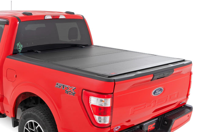 Hard Tri-Fold Flip Up Bed Cover | 5'7" Bed | Ford F-150 2WD/4WD (2015-2020) - The Suspension Specialists