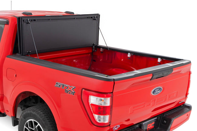 Hard Tri-Fold Flip Up Bed Cover | 5'7" Bed | Ford F-150 2WD/4WD (2015-2020) - The Suspension Specialists