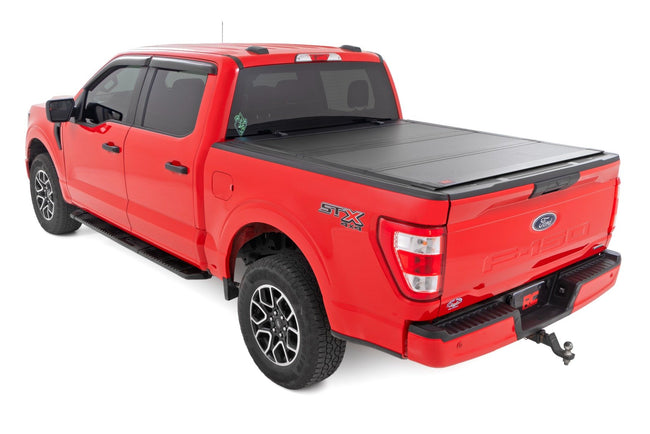 Hard Tri-Fold Flip Up Bed Cover | 5'7" Bed | Ford F-150 2WD/4WD (2015-2020) - The Suspension Specialists