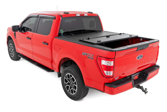 Hard Tri-Fold Flip Up Bed Cover | 5'7" Bed | Ford F-150 2WD/4WD (2015-2020) - The Suspension Specialists