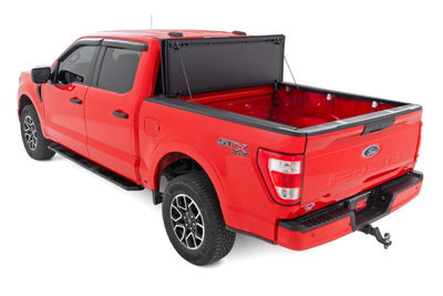Hard Tri-Fold Flip Up Bed Cover | 5'7" Bed | Ford F-150 2WD/4WD (2015-2020) - The Suspension Specialists