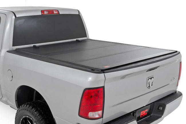 Hard Tri-Fold Flip Up Bed Cover | 6'4" Bed | Ram 1500/2500/3500 (10-25 & Classic) - The Suspension Specialists