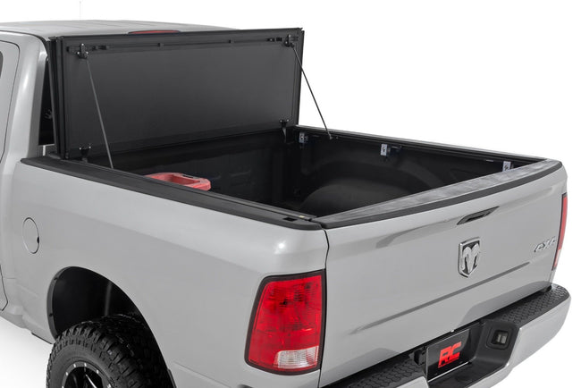 Hard Tri-Fold Flip Up Bed Cover | 6'4" Bed | Ram 1500/2500/3500 (10-25 & Classic) - The Suspension Specialists