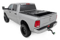 Hard Tri-Fold Flip Up Bed Cover | 6'4" Bed | Ram 1500/2500/3500 (10-25 & Classic) - The Suspension Specialists