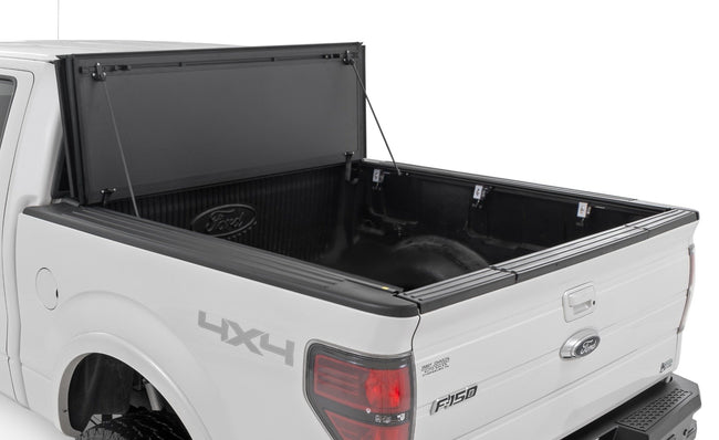 Hard Tri-Fold Flip Up Bed Cover | 5'7" Bed | Ford F-150 2WD/4WD (2004-2014) - The Suspension Specialists
