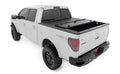 Hard Tri-Fold Flip Up Bed Cover | 6'7" Bed | Ford F-150 2WD/4WD (2004-2014) - The Suspension Specialists