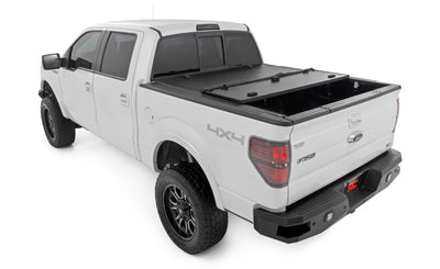 Hard Tri-Fold Flip Up Bed Cover | 6'7" Bed | Ford F-150 2WD/4WD (2004-2014) - The Suspension Specialists