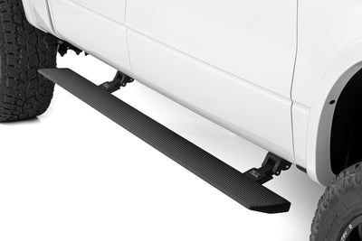 Rough Country Power Running Boards | Dual Electric Motor | Crew Cab | Ford F-150 (09-14) - The Suspension Specialists