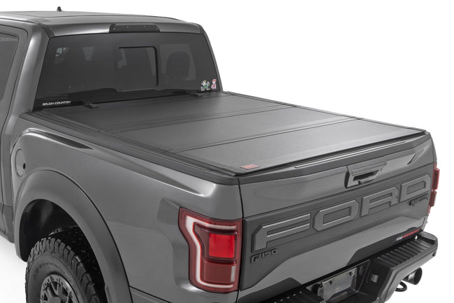 Hard Tri-Fold Flip Up Bed Cover | 5'7" Bed | Ford F-150 (21-25)/F-150 Lightning (22-25) - The Suspension Specialists