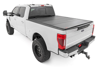 Hard Tri-Fold Flip Up Bed Cover | 6'10" Bed | Ford F-250/F-350 Super Duty (17-26) - The Suspension Specialists
