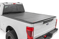 Hard Tri-Fold Flip Up Bed Cover | 6'10" Bed | Ford F-250/F-350 Super Duty (17-26) - The Suspension Specialists