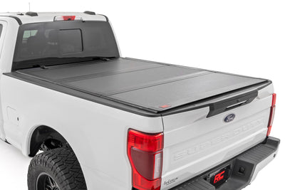 Hard Tri-Fold Flip Up Bed Cover | 6'10" Bed | Ford F-250/F-350 Super Duty (17-26) - The Suspension Specialists