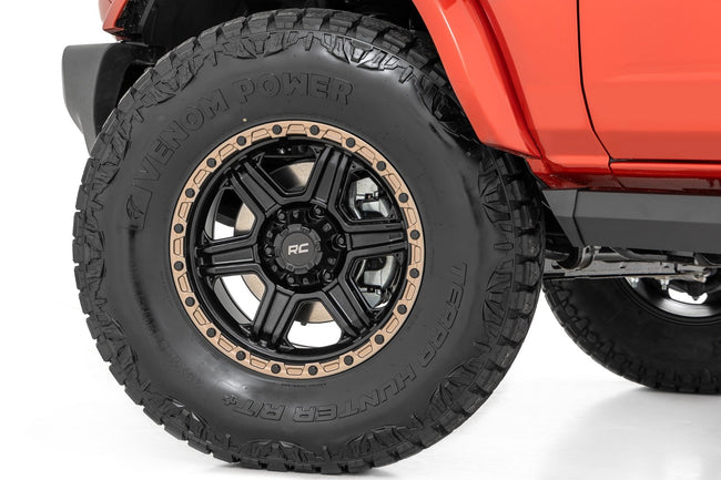 Rough Country 79 Series Wheel | One-Piece | Semi Gloss Black w/Bronze Ring | 18x9 | 6x5.5 | 0mm - The Suspension Specialists