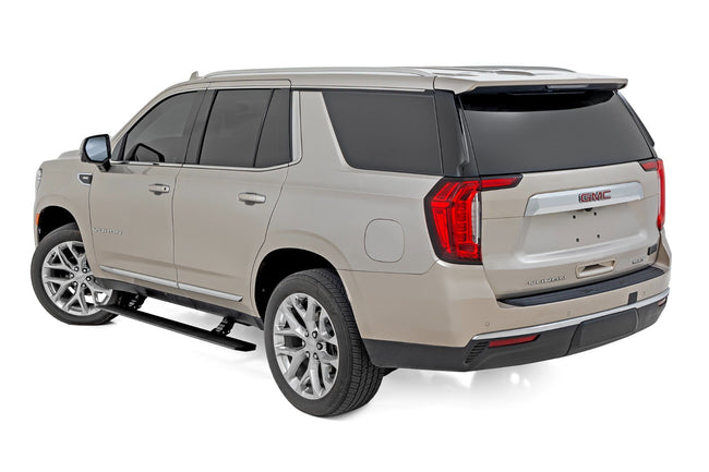 Rough Country Power Running Boards | Dual Electric Motor | GMC Yukon XL 1500 2WD/4WD (21-25) - The Suspension Specialists