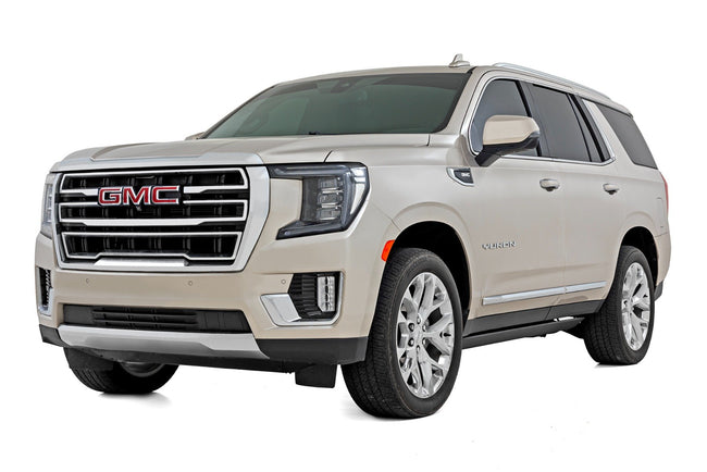 Rough Country Power Running Boards | Dual Electric Motor | GMC Yukon XL 1500 2WD/4WD (21-25) - The Suspension Specialists