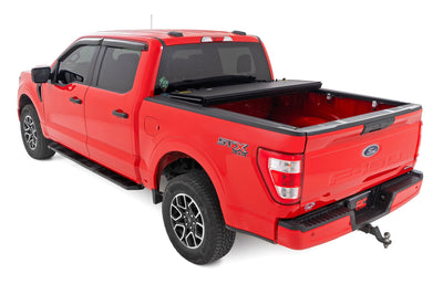 Hard Tri-Fold Flip Up Bed Cover | 5'7" Bed | Ford F-150 2WD/4WD (2015-2020) - The Suspension Specialists