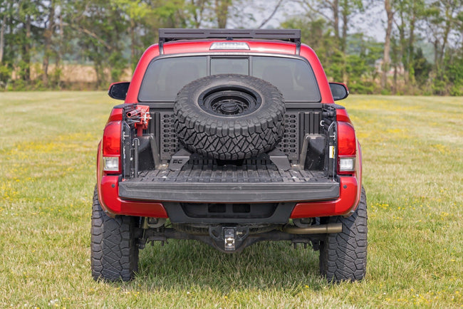 Bed Mount Spare Tire Carrier | Universal (5x5.5 6x5.5 6x135 & 5x5.0 Bolt Patterns) - The Suspension Specialists